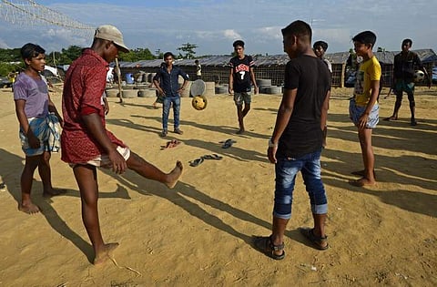 Rohingya Muslim refugees play chinlone at Kutupalong refugee camp in the Bangladeshi district of Ukhia.|AFP