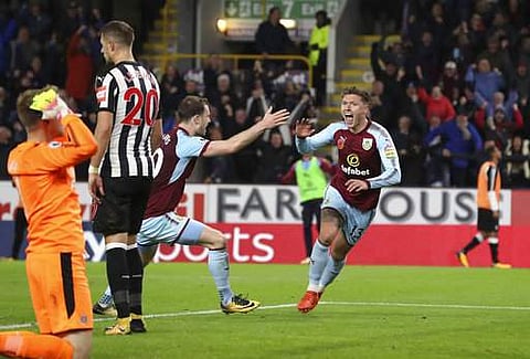 Burnley's Jeff Hendrick, right, celebrates scoring his side's first goal of the game with Ashley Barnes during the English Premier League soccer match Burnley versus Newcastle at Turf Moor. | AP