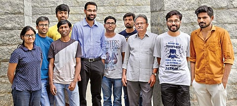 Professor Bala Iyer (third from right) and P Ajith (sixth from right) with rest of team