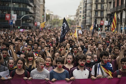 Independence supporters march during a demonstration downtown Barcelona. (Photo | AP)