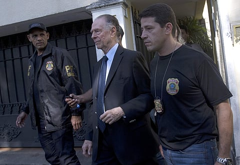 Carlos Nuzman, President of the Brazilian Olympic Committee(center)is escorted by federal police officers in Rio de Janeiro. (Photo | AP)