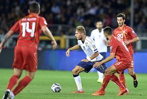 Italy's Ciro Immobile, center, controls the ball during a World Cup Group G qualifying soccer match between Italy and Macedonia in Turin, Italy, Friday, Oct. 6, 2017. | AP