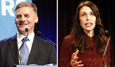 New Zealand's Prime Minister Bill English, left, and Labour Party leader Jacinda Ardern both talking to their supporters. (Photo | AP)