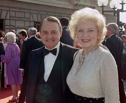 John Hillerman, left, and Betty White, right, arrive at Emmy Awards in Pasadena, Calif., in Sept. 1985. (Photo | Associated Press)