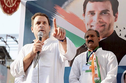 Congress vice-president Rahul Gandhi addressing a rally during his road show at Valsad district in Gujarat on Friday. | PTI