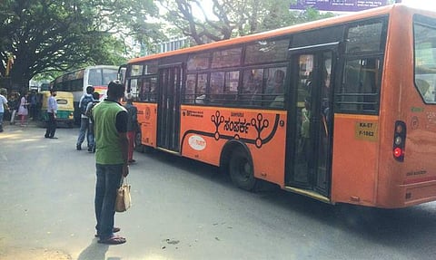 With no designated bus stand, buses stop on the road, making it dangerous for residents