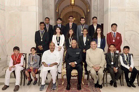 President Ram Nath Kovind in a group photograph with the awardees during the National Child Awards function on the occasion of Children's Day at Rashtrapati Bhavan in New Delhi on Tuesday. (PTI Photo)