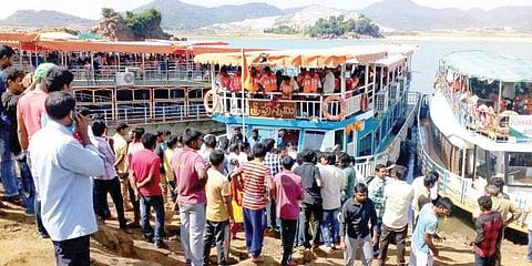 Officials checking licences of boats at Purushothapatnam village in East Godavari district on Wednesday | Express