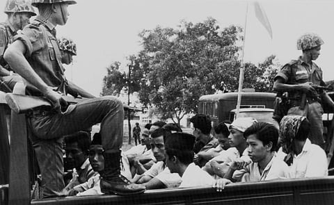 In this October 30, 1965 photo, members of the Youth Wing of Indonesian Communist Pary are taken to a Jakarta prison following a crackdown on communists after an abortive coup against President Sukarno earlier in the month. (Associated Press)