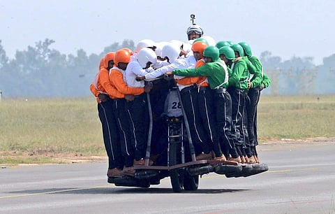 58 men mounted a single 500 cc Royal Enfield motorcycle and rode it for a distance of 1200 meters as part of a display at the Air Force Station Yelahanka. (Express Photo Service)