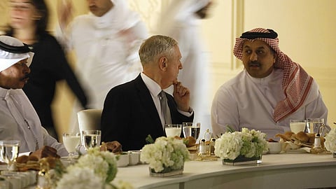Qatar’s Minister of Defense Khalid bin Mohammad Al-Attiyah, right, welcomes U.S. Defense Secretary James Mattis at his residence in Doha, Qatar, Saturday April 22, 2017. (FILE | AP)
