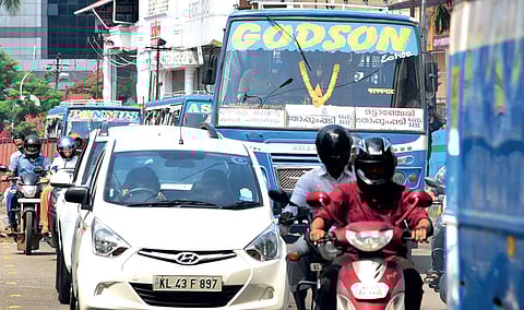 Private buses plying in the city flouting traffic rules | Albin Mathew