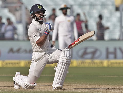 Indian captain Virat Kohli celebrates scoring his 18th Test ton. | AP