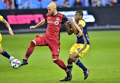 Toronto FC skipper Michael Bradley (L) | AP