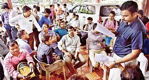 Members of TN Post Graduate Doctors Associations protesting against the recruitment of fresh candidates for government hospitals ignoring their services, at the Directorate of Medical Services Office in Chennai on Monday | P Jawahar