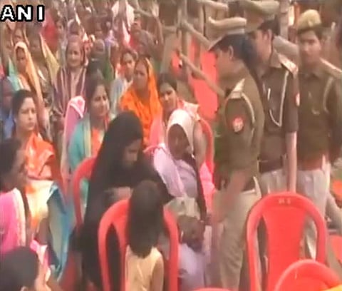 A video showing the woman being made to take off her black burqa minutes before the chief minister makes an appearance at the rally yesterday has gone viral.