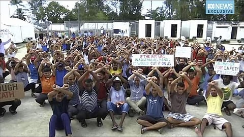 Asylum seekers protest the closure of their detention center on Manus Island, Papua New Guinea. (Associated Press)