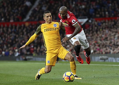Brighton & Hove Albion's Anthony Knockaert, left, and Manchester United's Ashley Young clash during the English Premier League soccer match at Old Trafford in Manchester, England. | AP
