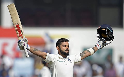 Indian cricket captain Virat Kohli celebrates his century on the third day of 2nd test match against Sri Lanka in Nagpur on Sunday. | PTI