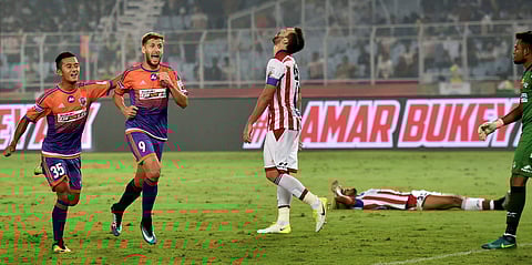 FC Pune City's Emiliano Alfaro (9) celebrates scoring against ATK | PTI