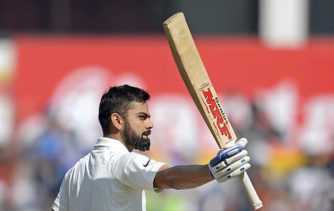 Indian cricket captain Virat Kohli celebrates his century on the third day of second Test match against Sri Lanka in Nagpur on Sunday. | PTI