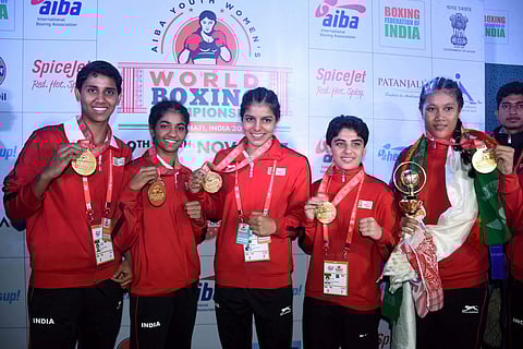 Left to Right Indian Gold medalists boxers Sashi Chopra Nitu Sakshi Jyoti and Ankushita Boro posing for a photograph during the AIBA Youth Women's World Boxing Championship 2017 at Nabin Chandra Bordoloi Indoor Stadium in Guwahati on Sunday. | PTI