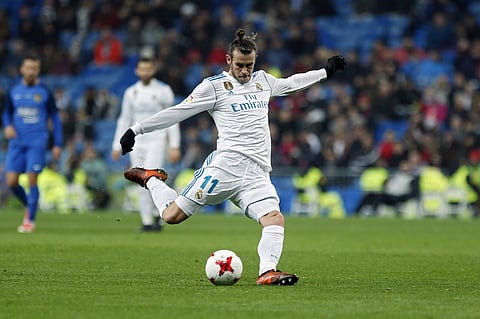 Real Madrid's Gareth Bale shoots the ball during a Spanish Copa del Rey round of 32 second leg soccer match between Real Madrid and Fuenlabrada at the Santiago Bernabeu stadium in Madrid, Tuesday, Nov. 28, 2017. | AP