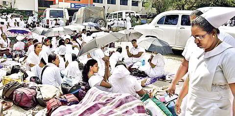 Protesting nurses continue their stir demanding to make their services permanent at the DMS in Chennai on Tuesday | p jawahar