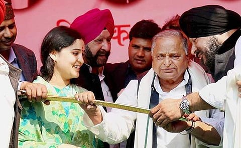 Mulayam Singh with daughter-in-law Aparna Yadav at a rally in Lucknow (File | Pti)