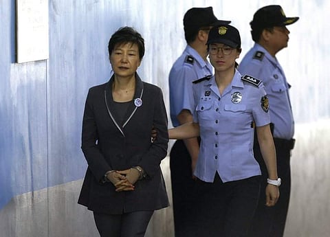 Park denies multiple charges including bribery and abuse of power and is being held in custody. (Photo | AP)