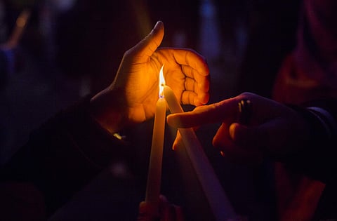 People light candles as they gather to remember the victims of the recent truck attack during a candle light walk along the Hudson River near the crime scene on Thursday, Nov. 2, 2017, in New York. (Photo | Associated Press)