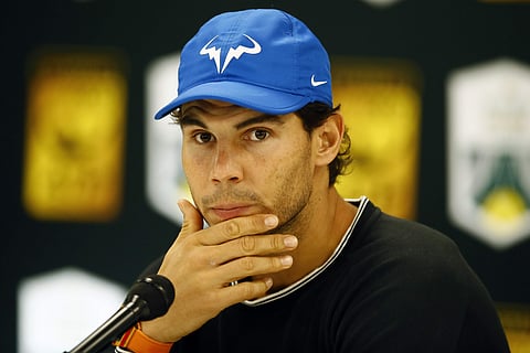 Rafael Nadal of Spain attends a press conference to announce he pulled out of the Paris Masters with a right knee injury | AP
