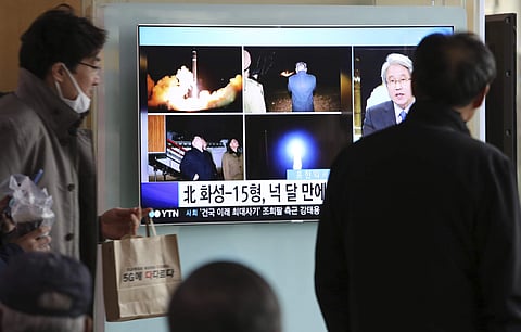 People watch a TV screen showing a local news program reporting about North Korea's missile launch, at the Seoul Railway Station in Seoul, South Korea, Thursday, Nov. 30, 2017. After 2 ½ months of relative quiet, North Korea launched its most powerful wea