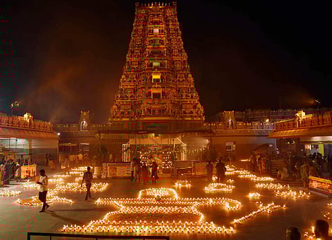 Devotees take part in Koti Deepotsavam on the occasion of Kartik Purnima at Goddess Kanaka Durga temple in Vijayawada.