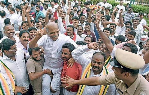 Members of transport associations celebrate after the state government agreed to their demands | Nagaraja Gadekal