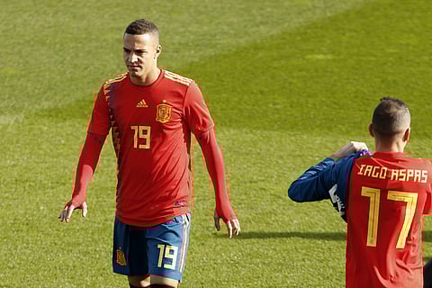 Spain's Rodrigo Moreno, wearing the new soccer kit for the 2018 World Cup, walks along the pitch with teammates during a training session in Las Rozas, outskirts Madrid, Spain, Wednesday, Nov. 8, 2017.| AP