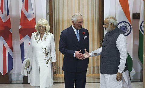 PM Modi shakes hand with Prince Charles as his wife Camilla looks on before a meeting in New Delhi on Wednesday. (EPS | Shekhar Yadav)