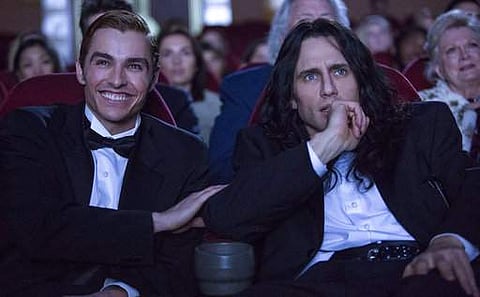 This image released by A24 shows Dave Franco, left, and James Franco in a scene from 'The Disaster Artist.' | AP