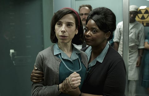 This image released by Fox Searchlight Pictures shows Sally Hawkins, left, and Octavia Spencer in a scene from the film 'The Shape of Water.' (AP)