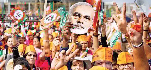 Supporters of the BJP during a rally on the eve of the Gujarat elections | PTI