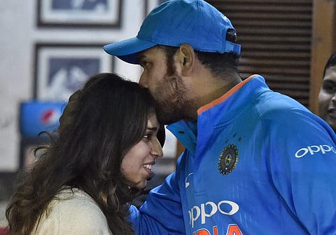 India's captain Rohit Sharma with his wife Ritika Sajdeh after winning the second one-day international cricket match against Sri Lanka in Mohali. | PTI