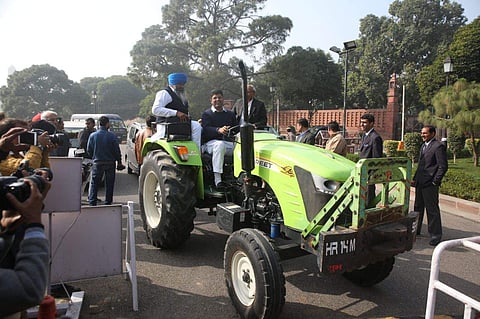 Dushyant Chautala, the country's youngest parliamentarian attracted eyeballs when he reached Parliament to attend the Winter Session riding a tractor. (Express Photo Service | Shekhar Yadav)