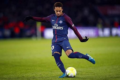 PSG's Neymar kicks to score a goal during his French League One soccer match between Paris Saint Germain and Troyes, at the Parc des Princes stadium in Paris, France. |AP
