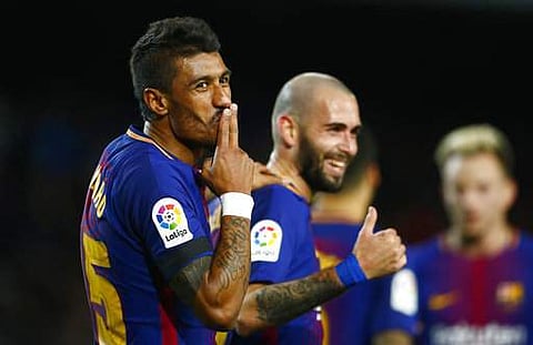FC Barcelona's Paulinho celebrates after scoring against Deportivo Coruna | AP