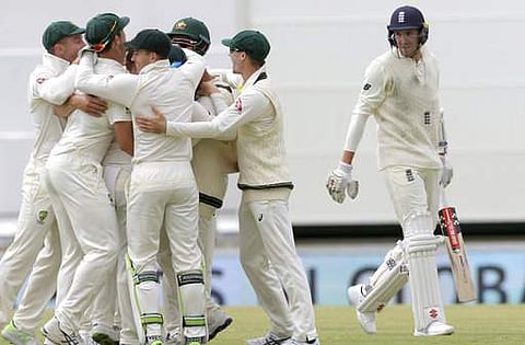 Australian players celebrate the dismissal of England's Craig Overton during the final day of their Ashes cricket test match | AP