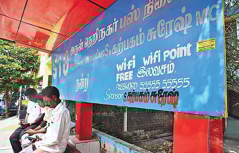 The username and password for free wi-fi displayed at a bus shelter on a Small Bus route in Arul Neri Nagar in Ward No. 5 of Sembakkam Municipality in Chennai | Sunish P Surendran
