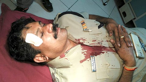 Injured ACP Shankar Marihal undergoing treatment at district hospital in Belagavi. (EPS)