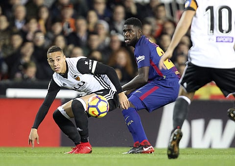 Barcelona's Samuel Umtiti (R) |AP