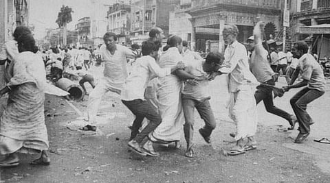 Congress leaders trying to protect Mamata Banerjee a moment before she was hit with a lathi by CPM youth leader Lalu Alam at Hazra Crossing in Kolkata on August 16, 1990. | Express