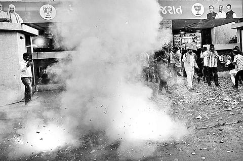 BJP workers celebrate the party’s win in the Gujarat elections | PTI